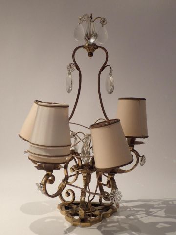 Girandole en laiton à quatre bras de lumières...