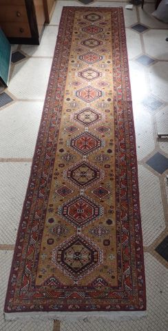Tapis galerie mécanique dans le goût de l'orient...