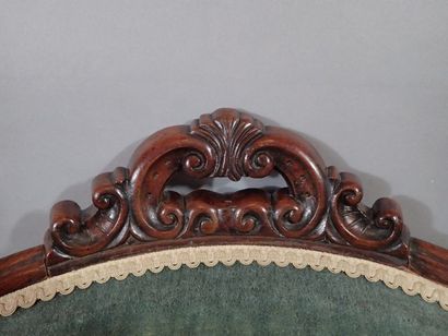 Bergère en acajou mouluré et sculpté, le...
