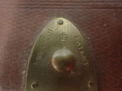 Portefeuille en cuir compartimenté avec un...