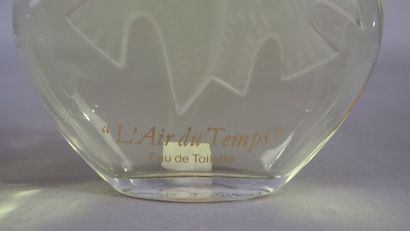 Ensemble de deux flacons de parfum Nina Ricci...