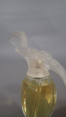 Ensemble de quatre parfums :
- NINA RICCI,...