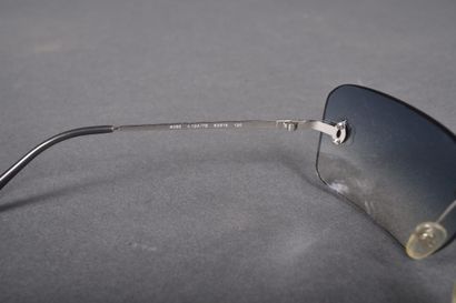 CHANEL
Pair of sunglasses with slightly bluish...