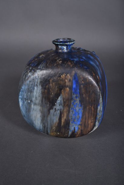 Blue, beige and black enameled stoneware...
