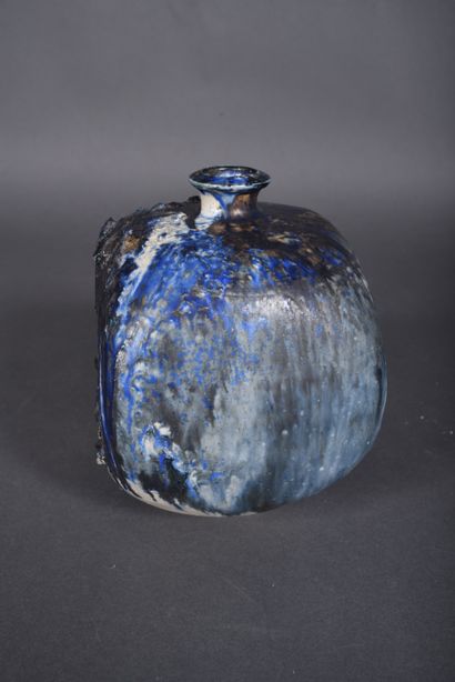 Blue, beige and black enameled stoneware...