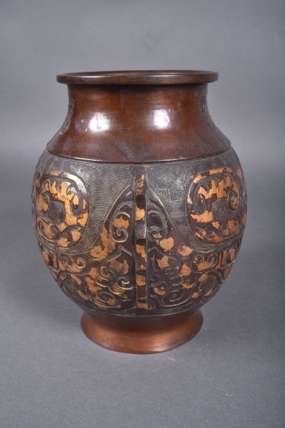 Bronze vase with brown patina and gilded...