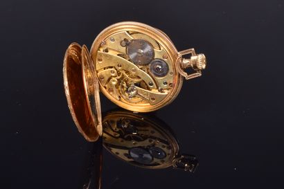 UNIC. Soap watch in 18K gold, the bezel adorned...