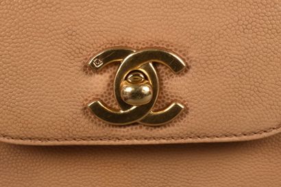 CHANEL
Small handbag in beige grained leather,...
