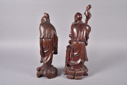 China, 20th century,
Two carved wooden groups,...