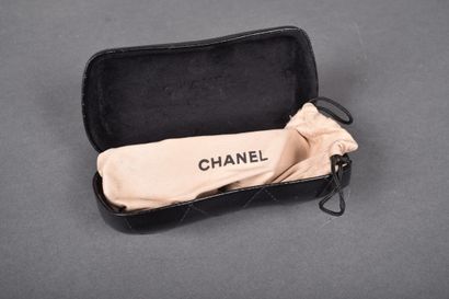 CHANEL
Pair of sunglasses with slightly bluish...