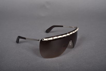 CHANEL
Pair of mask-style sunglasses embellished...
