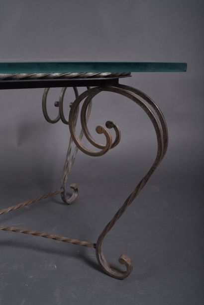 Wrought-iron coffee table with twisted structure...