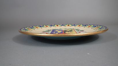 LONGWY. Large dish in Longwy enamels decorated...