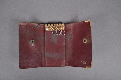 CARTIER 
Cardboard box comprising a wallet...