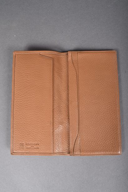 GIVENCHY 
Beige grained leather wallet.
Some...