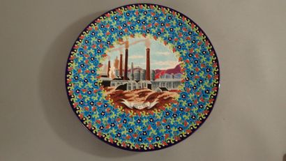 LONGWY. Large circular dish in Longwy enamels...