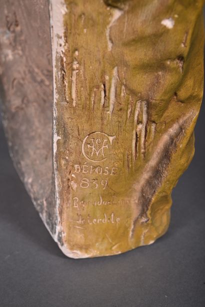 Group in green patinated terra cotta decorated...