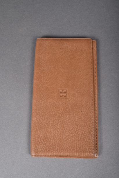 GIVENCHY 
Beige grained leather wallet.
Some...