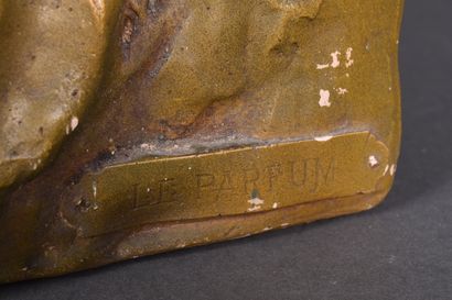 Group in green patinated terra cotta decorated...