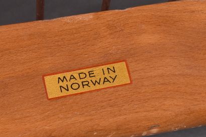 Scandinavian teak three-seater bench resting...
