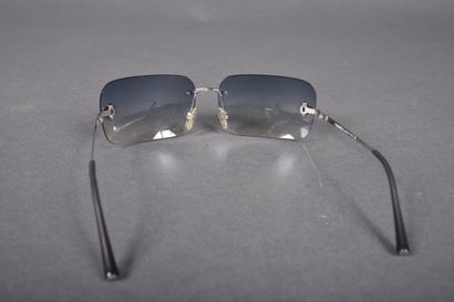 CHANEL
Pair of sunglasses with slightly bluish...