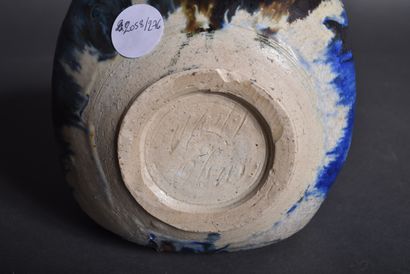 Blue, beige and black enameled stoneware...