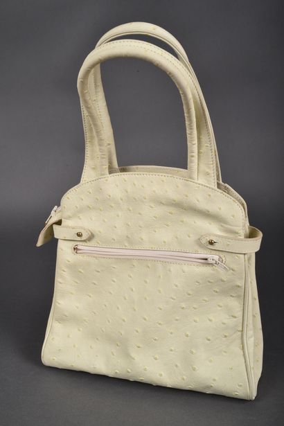 CLAUDE GERARD
Hand-held bag in very light...