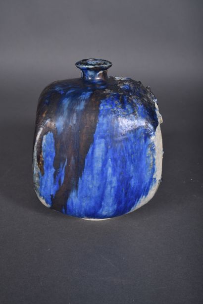 Blue, beige and black enameled stoneware...