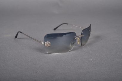 CHANEL
Pair of sunglasses with slightly bluish...
