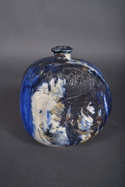 Blue, beige and black enameled stoneware...