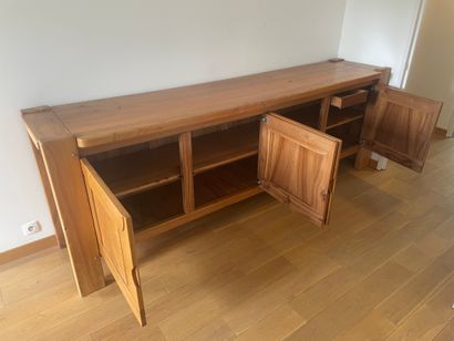 REGAIN HOUSE. Elm sideboard opening to four...