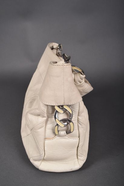 CHANEL
Off-white leather elongated bag with...