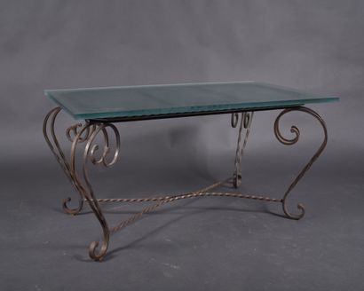 Wrought-iron coffee table with twisted structure...