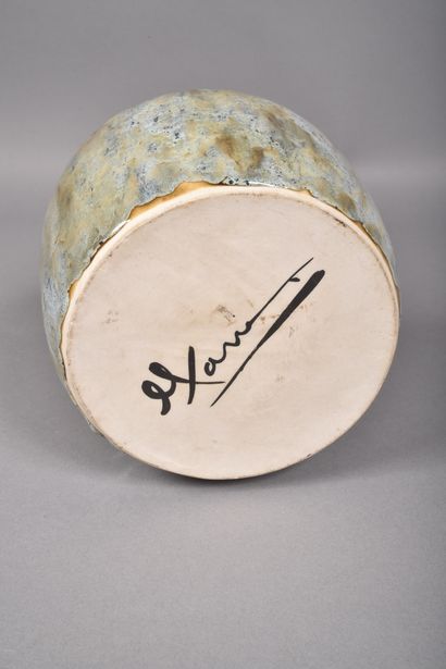 Blue and green flamed sandstone vase with...