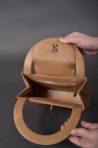 CHANEL
Small handbag in beige grained leather,...