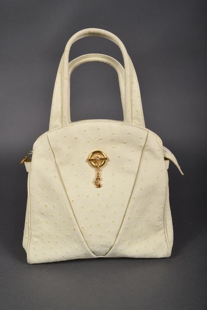 CLAUDE GERARD
Hand-held bag in very light...