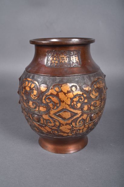 Bronze vase with brown patina and gilded...