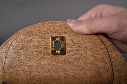 CHANEL
Small handbag in beige grained leather,...