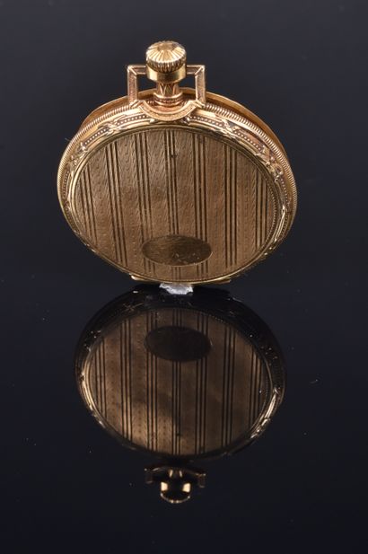 UNIC. Soap watch in 18K gold, the bezel adorned...