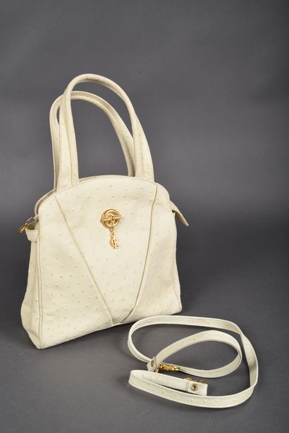 CLAUDE GERARD
Hand-held bag in very light...