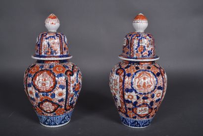 Pair of ribbed imari porcelain covered potiches...