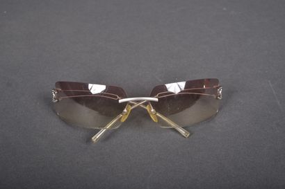 CHANEL
Pair of sunglasses with elongated,...