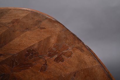 Set of three nesting tables in walnut veneer...