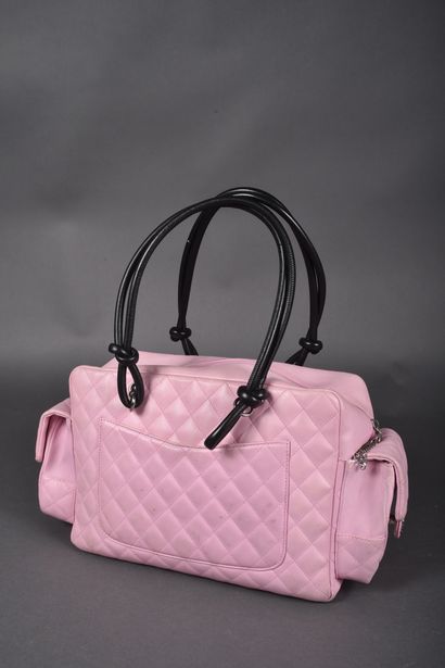 CHANEL
Pink quilted leather ReporterCambon...