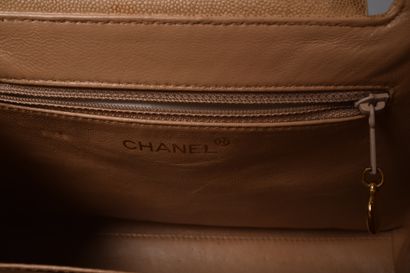 CHANEL
Small handbag in beige grained leather,...