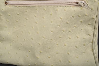 CLAUDE GERARD
Hand-held bag in very light...
