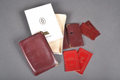 CARTIER 
Cardboard box comprising a wallet...