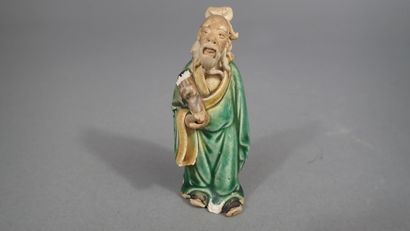 Ensemble de quatre statuettes en grès de...
