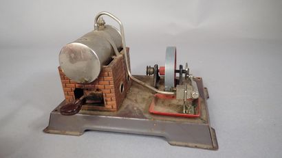 Machine à vapeur miniature en tôle. Marquée...