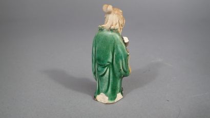 Ensemble de quatre statuettes en grès de...
